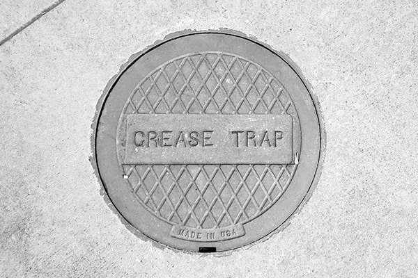 neglecting grease trap pumping can lead to blockages, foul odors, and potential health code violations